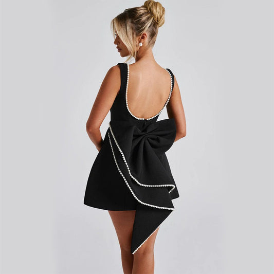 Oversized Pearl/Bow Detail Solid Color Backless Sleeveless A-Line Flared Formal Mini Dress