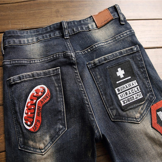 Men's Hip-Hop Badge Patchwork Design Ripped Fringe Skinny Jeans