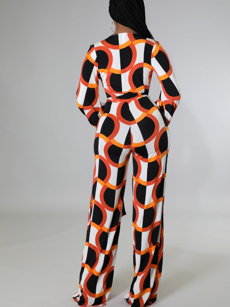 Geometric Checker Print Orange/Black Deep V-Neck Long Sleeve Jumpsuit w/ Sash Belt to 5X Plus Size