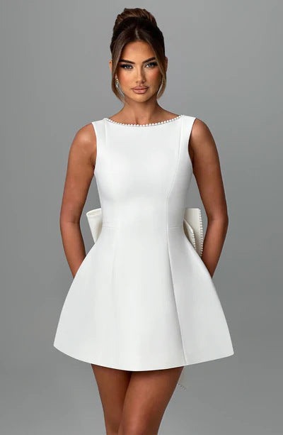 Oversized Pearl/Bow Detail Solid Color Backless Sleeveless A-Line Flared Formal Mini Dress