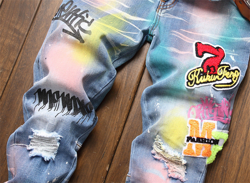 Ripped Men's Painted Patch Hip-Hop Graffiti Design Ruched Stretch Skinny Jeans