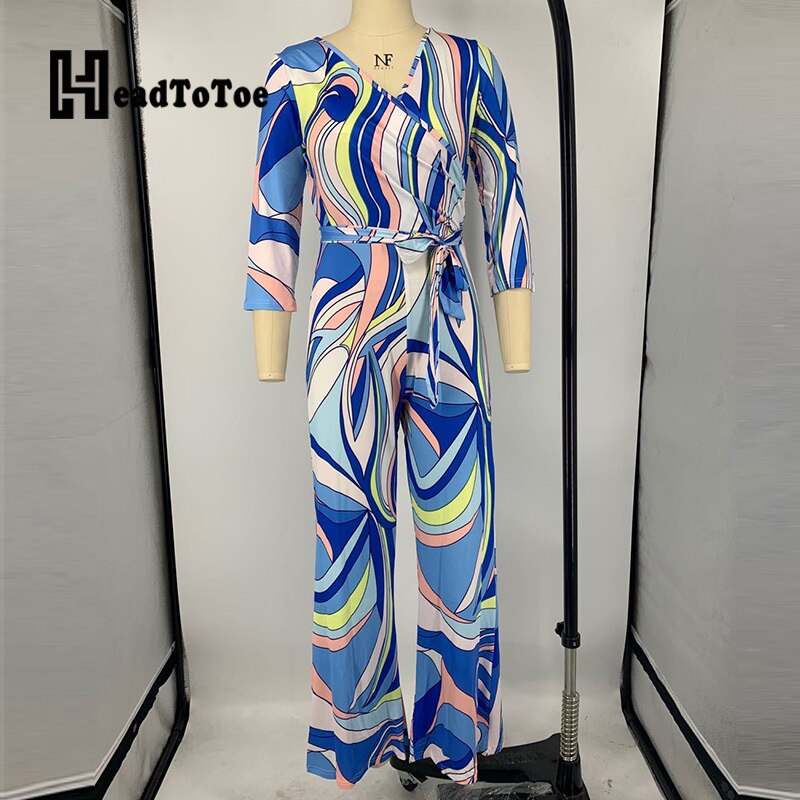 Swirl Design V-Neck Belted Wide Leg Long Sleeve Jumpsuit