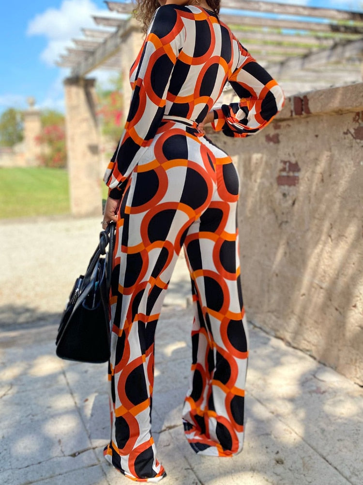 Geometric Print Deep V-Neck Long Sleeve Jumpsuit w/ Sash Belt to 5X Plus Size