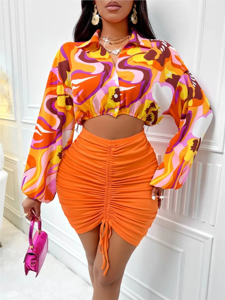 Geometric Swirl Print Long Lantern Sleeve Blouse + Orange Ruched Drawstring Skinny Mini Skirt 2-Piece Set