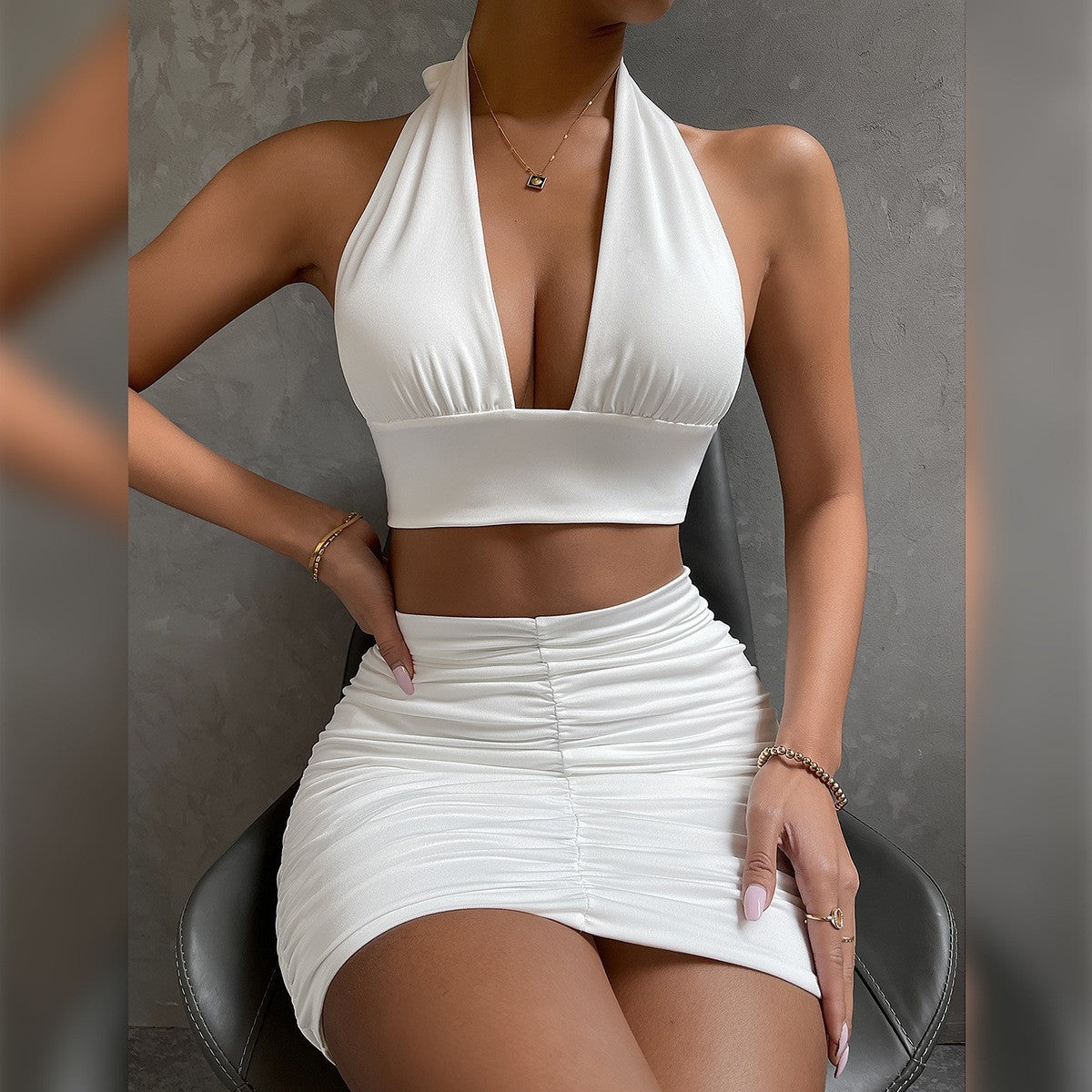 Sleeveless Solid Deep Plunge V-Neck Halter Lace-Up Crop Top + Pleated Mini Skirt 2-Piece Set